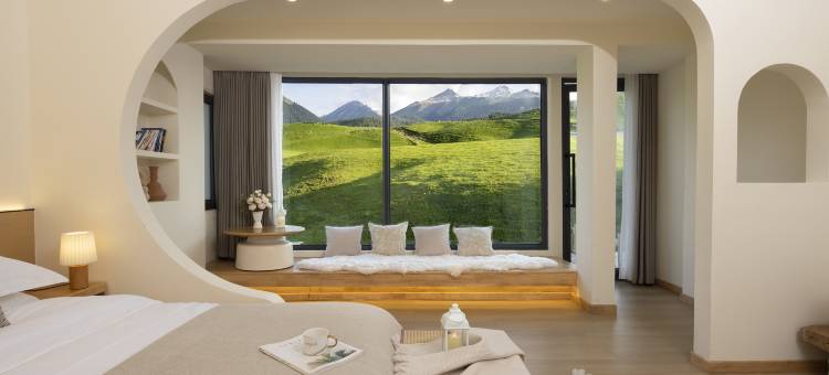 琼库什台春山颂月民宿图片