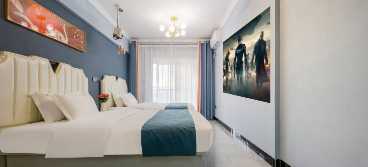 观山·鸣悦假日酒店(南宁东盟开发区客运站小帽山美食城店)图片