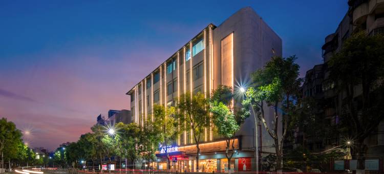 橙果酒店公寓(兴中广场孙文西步行街店)图片