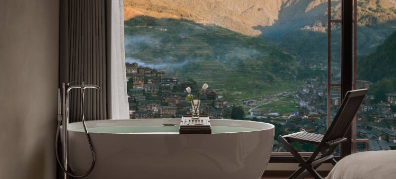 匠心一宅·屿归私汤民宿(西江千户苗寨观景台店)图片