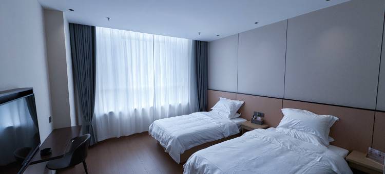 晴川主题酒店(呼和浩特东站机场店)图片