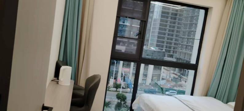 鑫桔民宿(昆明高铁南站店)图片