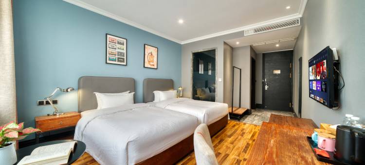 驻工坊创意酒店(温州双屿客运中心店)图片