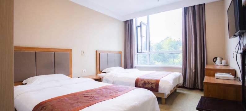 茗阳·宿温Suenn商务度假宾馆(长白山美人松雕塑公园店)图片