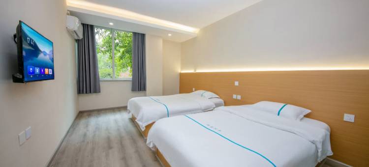 德阳玛吉阿米客栈(五洲广场工程大学店)图片