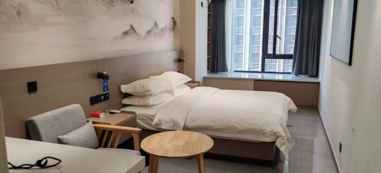 寓东观影酒店(万邦国际批发市场店)图片