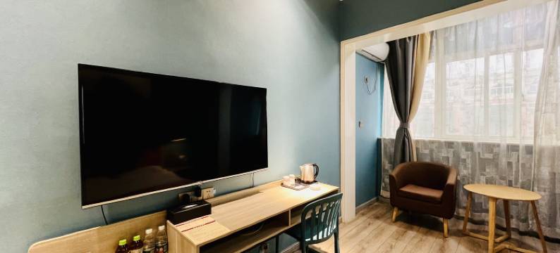 华悦时尚酒店(巩义新华北路大宋美食城店)图片