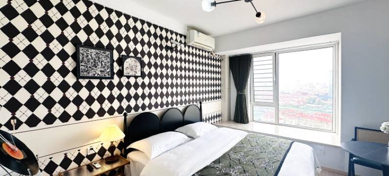 青岛归宿观影民宿(万达CBD店)图片