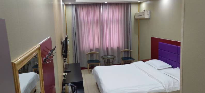 新郑阳光商务宾馆(高坡岩郑州经贸学院店)图片