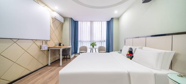 云曼澳米来酒店(国际塑料城店)图片