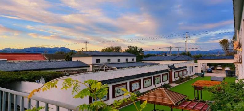 紫藤花开轻奢民宿图片