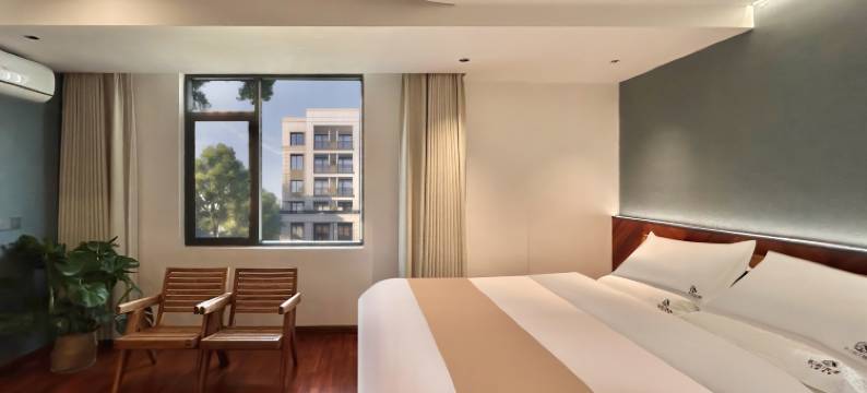 玖玖红木酒店(景洪西双版纳机场高铁站店)图片