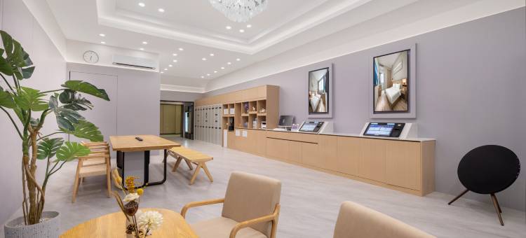 青岛新东程酒店(台东步行街万象城店)图片