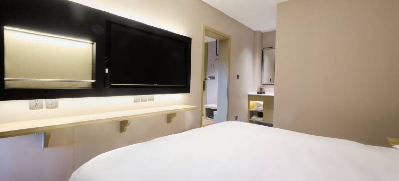 入阁三秋自助酒店(万达广场店)图片