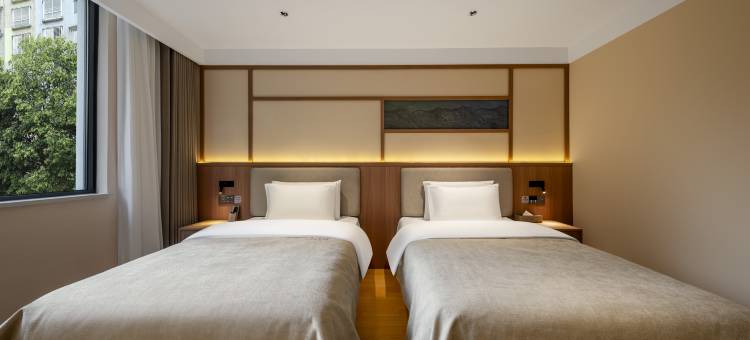 仟那美宿酒店(郑州中原福塔经北五路地铁站店)图片