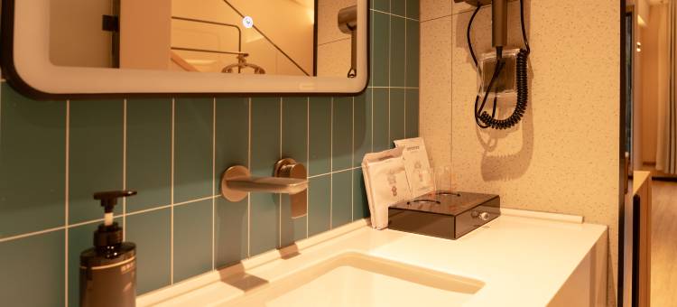 四季宜居酒店(银丰国际中药港店)图片