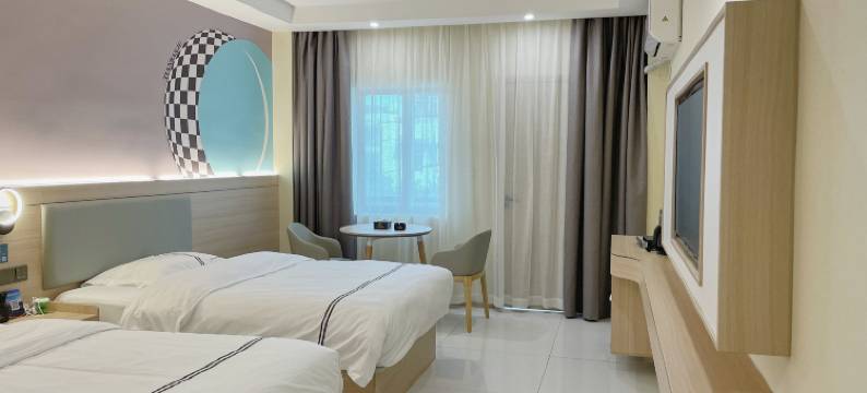 天然居酒店(防城区嘉乐城店)图片