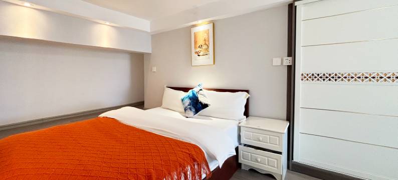 以礼娜姑民宿(云南财经大学龙泉校区万彩城店)图片