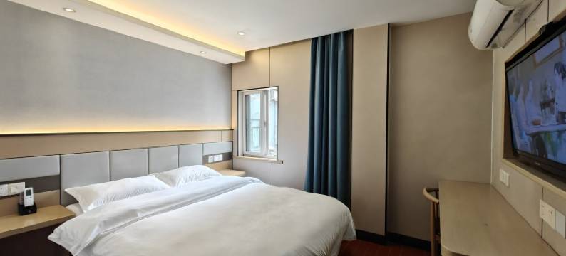 茸华宾馆(上海松江体育中心地铁站店)图片