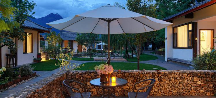 九相观山花园客栈(白沙雪山全景店)图片