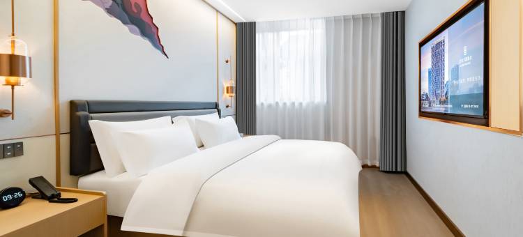 艺龙万国酒店(辽源火车站中医院店)图片