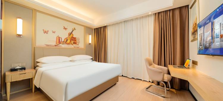 维也纳国际酒店(湛江保利原点广场渔人码头店)图片