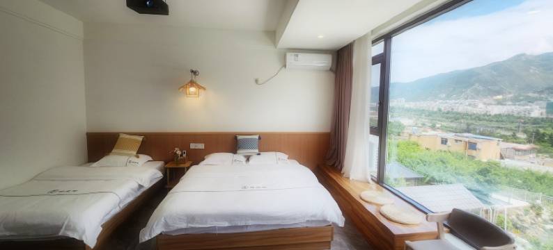 悦途·听风吟民宿(古羌城店)图片