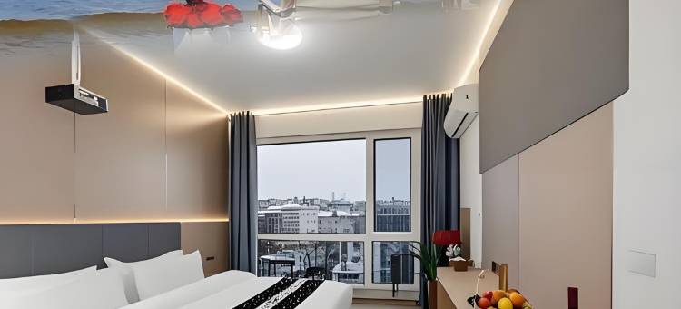 曼朵轻奢智能影音酒店(威海火炬八街国际海水浴场店)图片