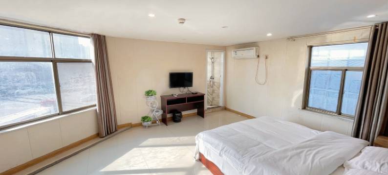 商丘富商宾馆(商丘南站店)图片