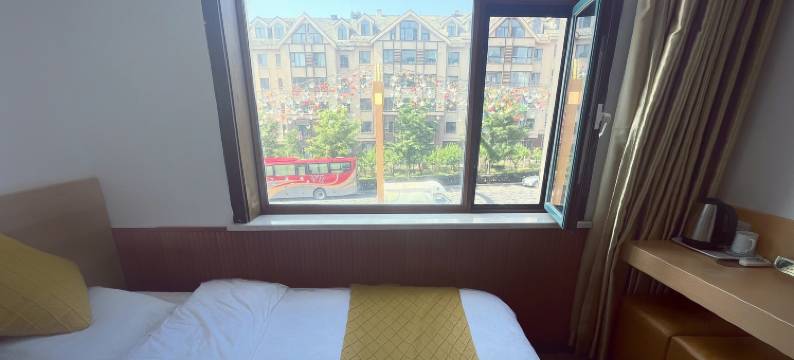 红豆杉宾馆(长白山北坡集散中心云顶市集店)图片