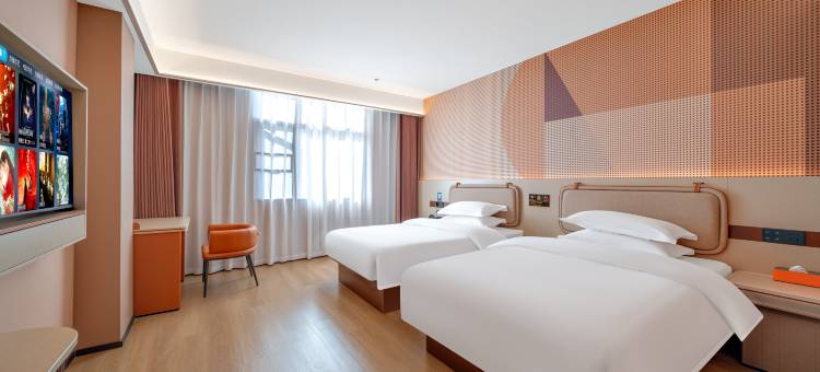 金桔酒店(联盛快乐城火车站店)图片