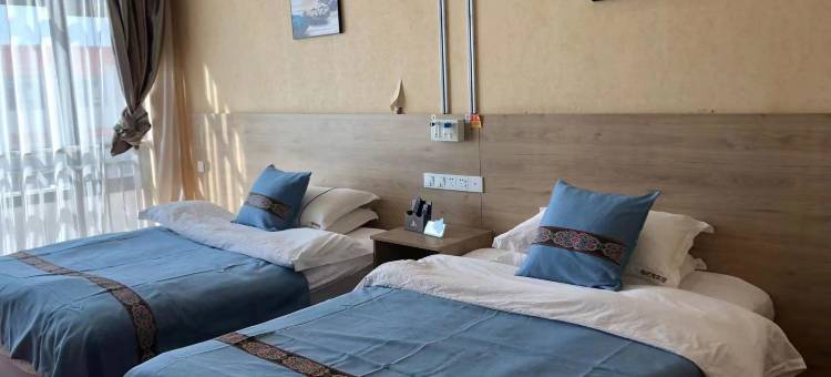 曲尼措宾馆图片