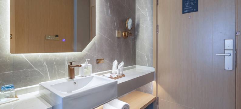 潮曼酒店(化州平定店)图片