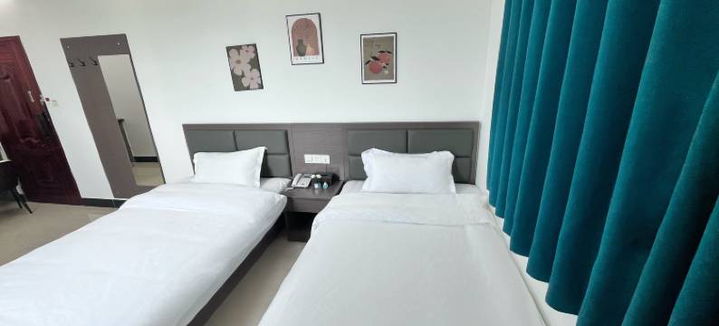 新里程商务酒店(下茆龙湾店)图片