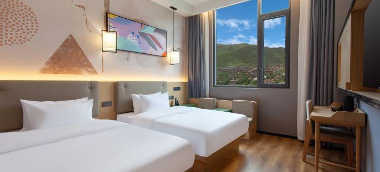 派酒店(巴塘中山广场店)图片