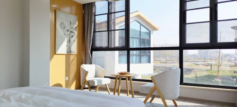 红源朴宿丨轻触智能丨modern轻奢美宿(北乡双河店)图片