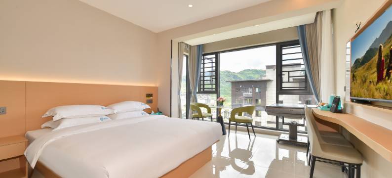 百里杜鹃美成酒店图片