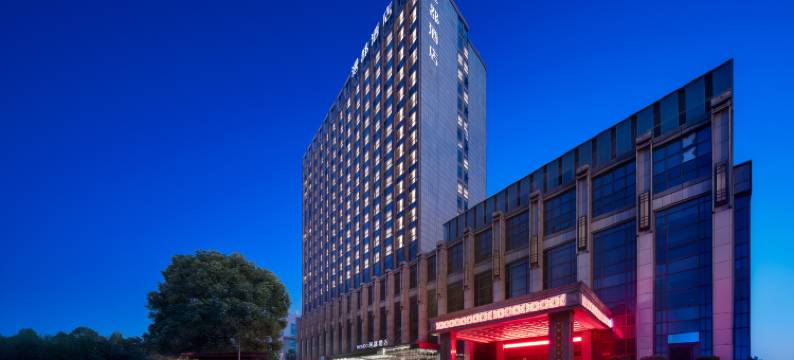 金华漫都酒店(婺城区政府万泰奥特莱斯店)图片