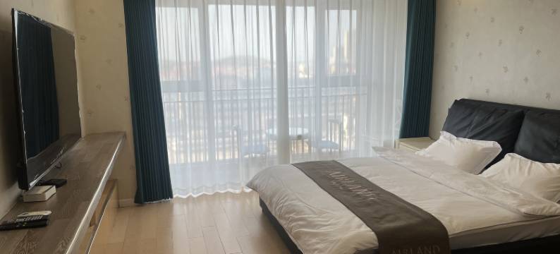 景加微超联民宿(国际海水浴场火炬八街店)图片