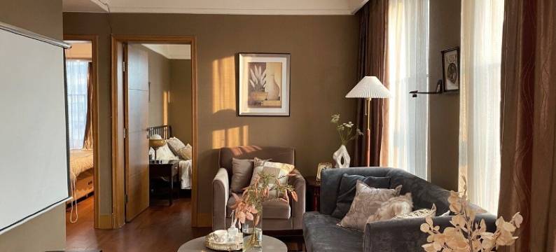 漫漫设计师民宿(观音桥步行街协信中心店)图片