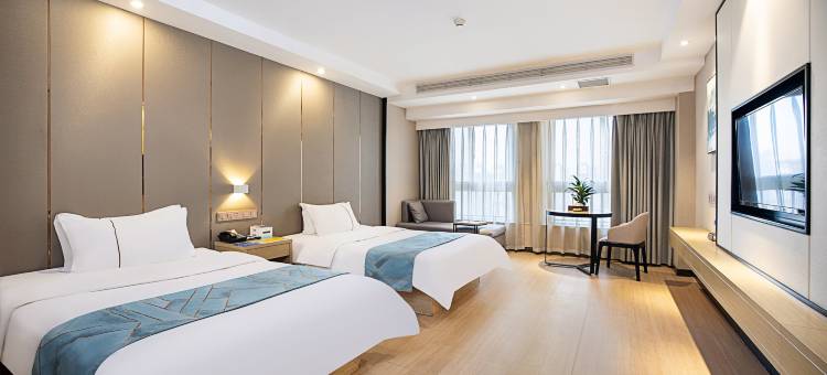 月伴湾商务酒店(长葛市政府葛天源轻轨站店)图片