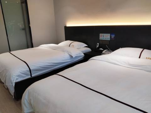 曼都酒店(红钢城地铁站武钢总医院店)