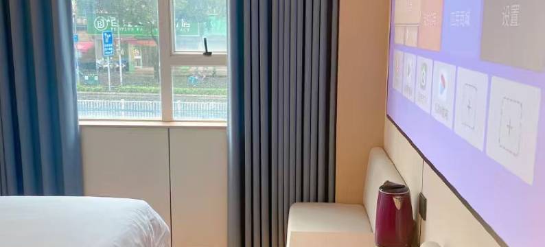 丽宁影音轻居酒店(明秀东路狮山公园地铁站店)图片