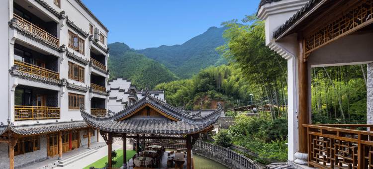 栖曼民宿(月亮湾风景区竹筏漂流起点店)图片