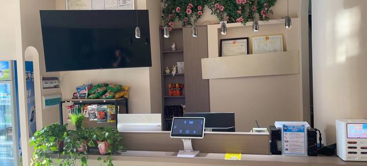 容悦轻居酒店(河南青华中英文学校店)图片