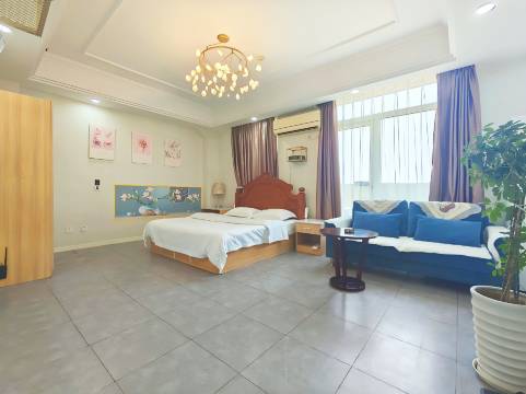 橘子·欢享电影公寓(鲁邦国际风情街店)