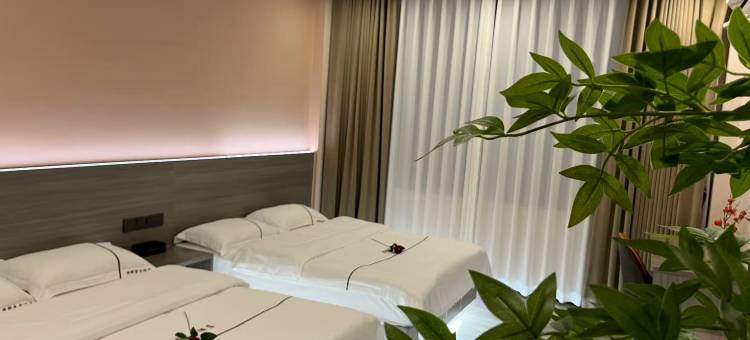 镇康明都商务酒店图片