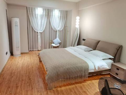 漫岛遇见民宿(万达广场店)