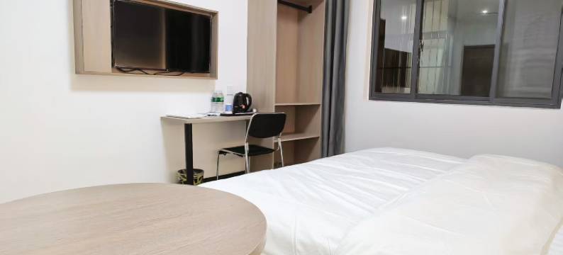 再寓美客酒店(泰山火车站店)图片