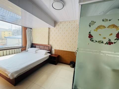 仁人旅馆(火车站西出口店)